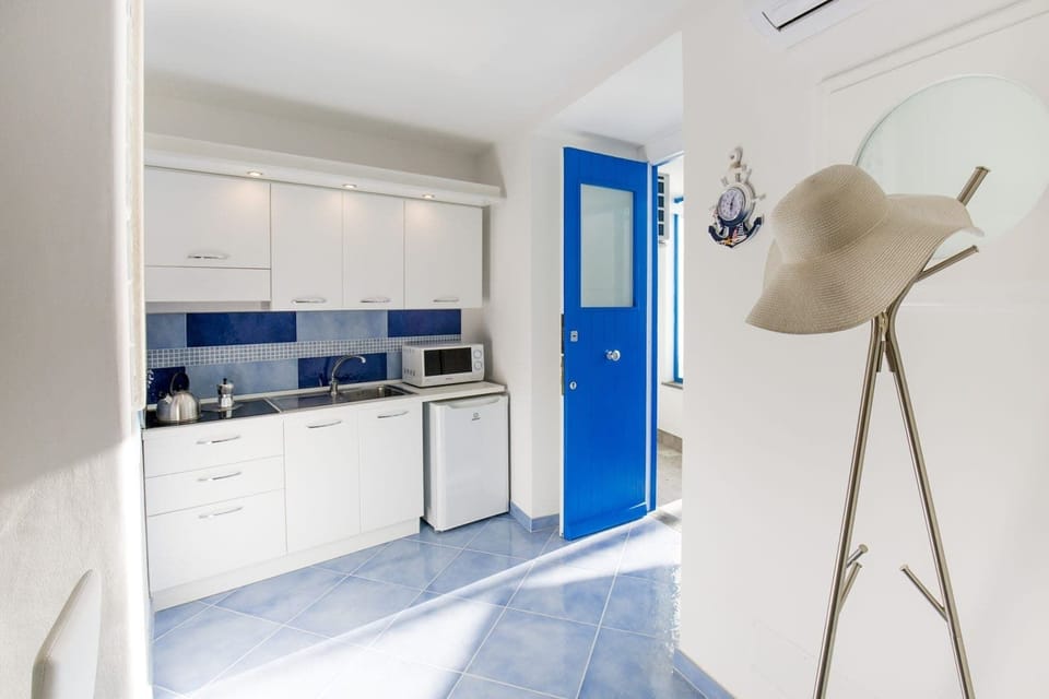 Signature Duplex, Balcony | Private kitchen | Espresso maker, electric kettle