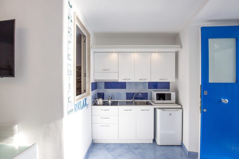 Signature Duplex, Balcony | Private kitchen | Espresso maker, electric kettle