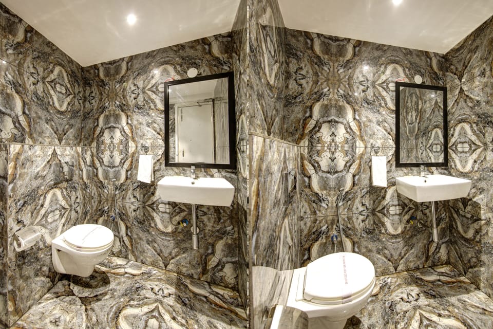 Presidential Suite, City View | Bathroom | Shower, bathrobes, slippers, towels