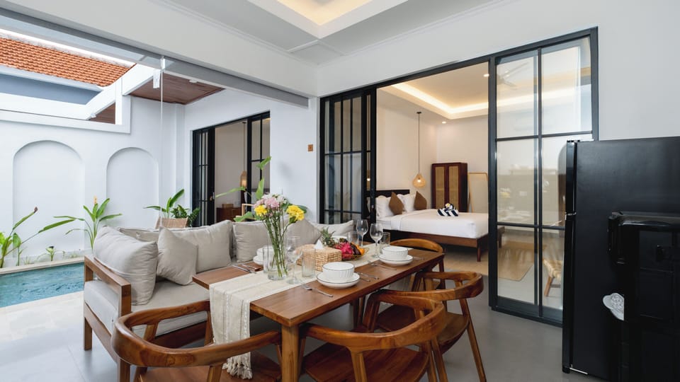 Family Villa | Living area | 32-inch LCD TV with cable channels