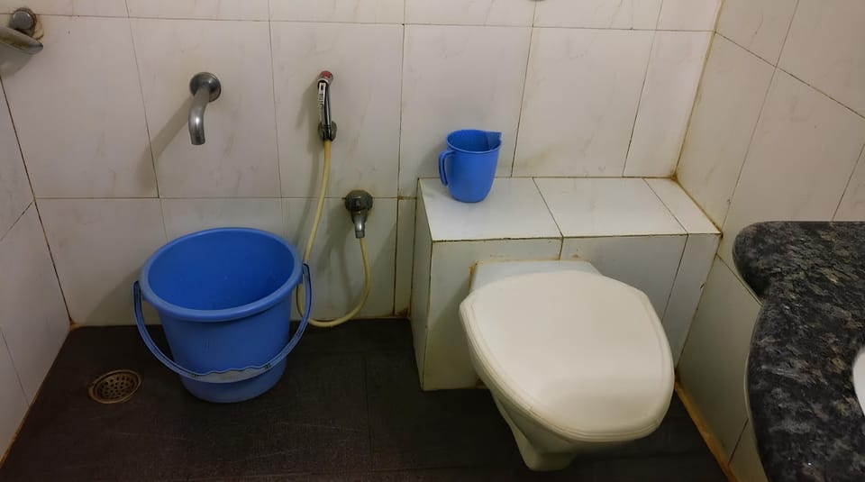 Basic Room | Bathroom | Shower, free toiletries, towels, soap