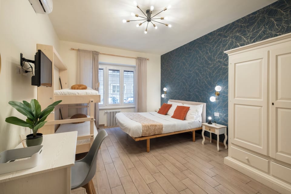 Comfort Quadruple Room | Premium bedding, down comforters, soundproofing, free WiFi