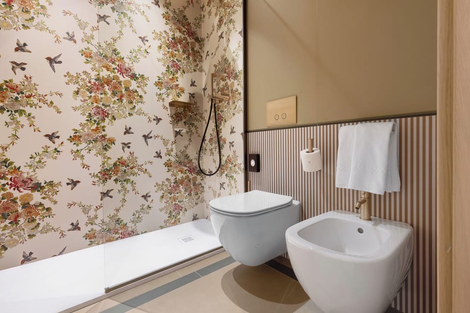 Hair dryer, slippers, bidet, towels