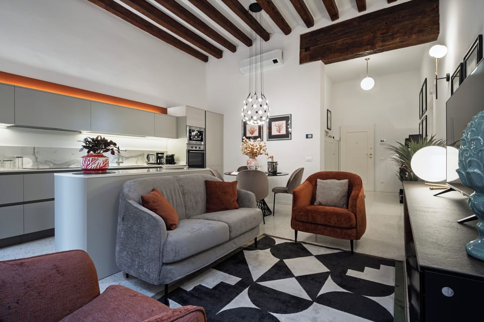 Luxury Apartment | Living area | Flat-screen TV