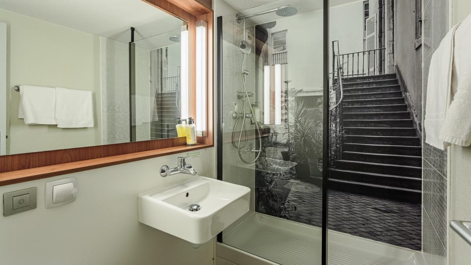 Eco-friendly toiletries, hair dryer, towels