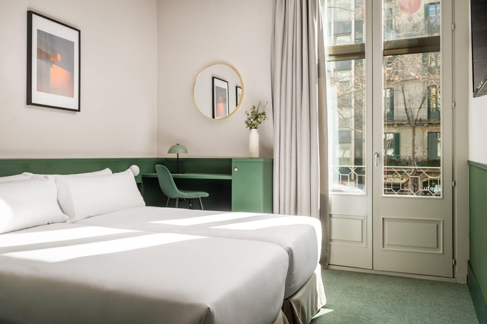 Twin Room, City View | Minibar, in-room safe, desk, laptop workspace