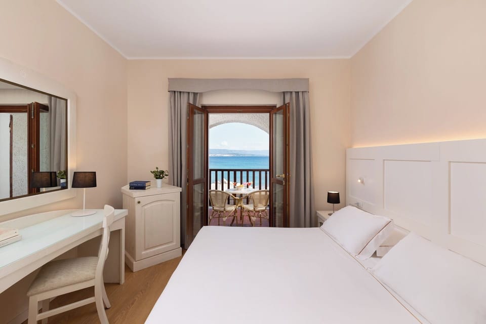 Double or Twin Room, Sea View | Select Comfort beds, minibar, in-room safe, desk