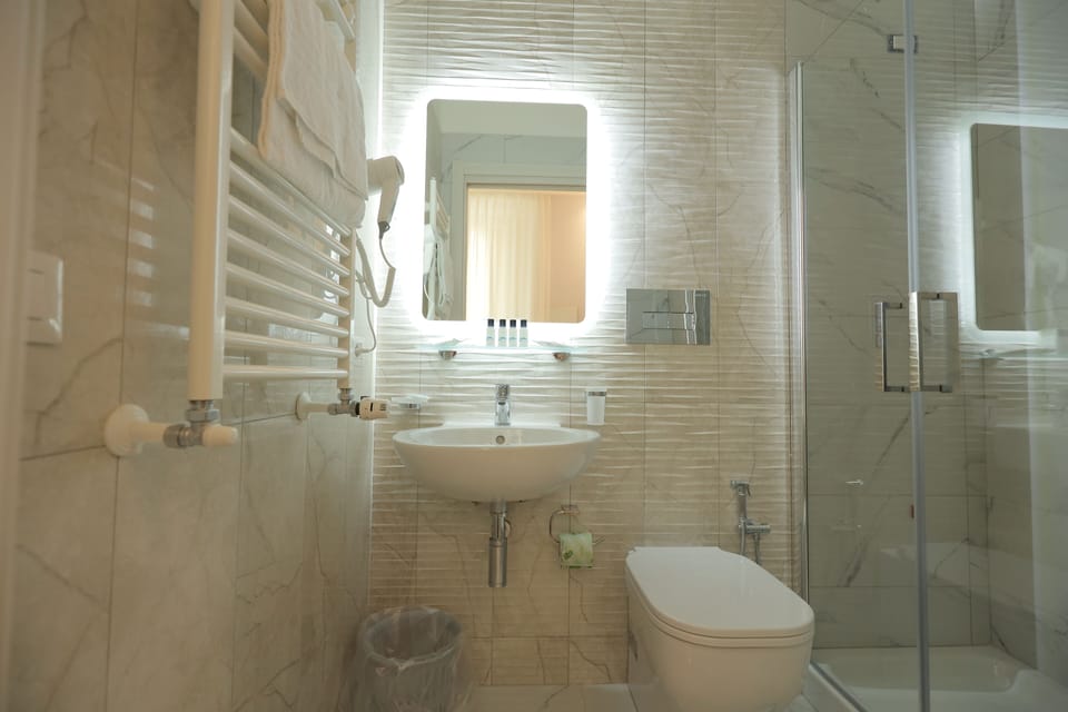 Shower, free toiletries, hair dryer, bathrobes