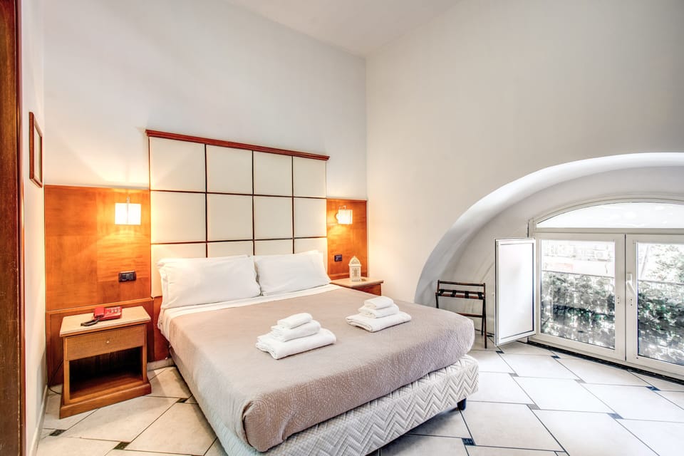 Premium bedding, down comforters, minibar, in-room safe