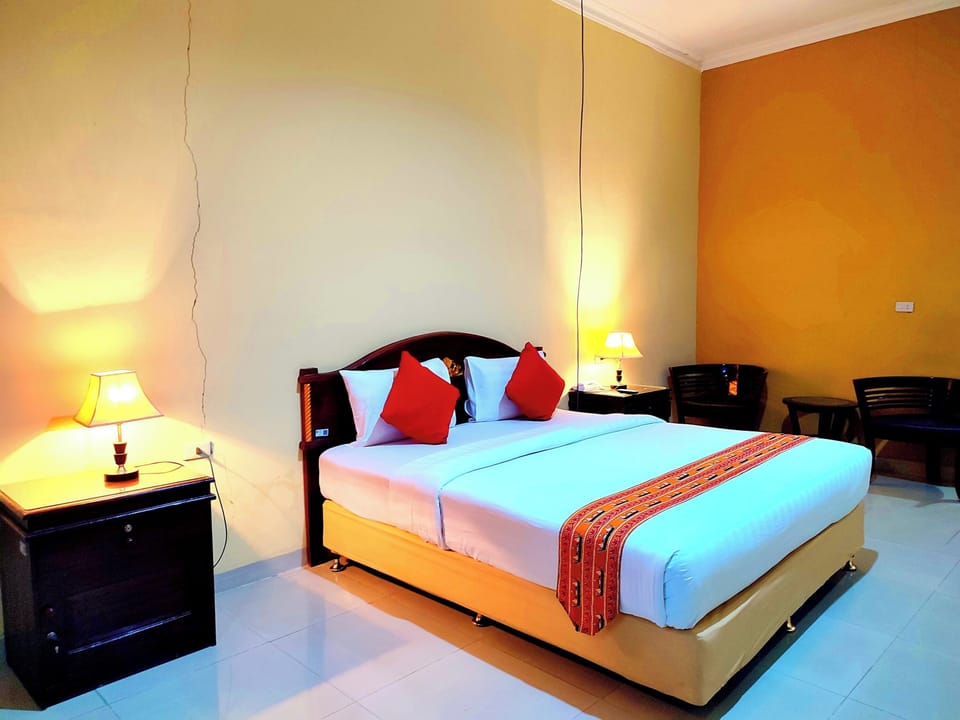 Deluxe Room | Desk, WiFi (free), bed sheets
