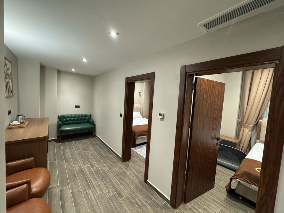 Luxury Studio Suite, City View | Desk, laptop workspace, free WiFi
