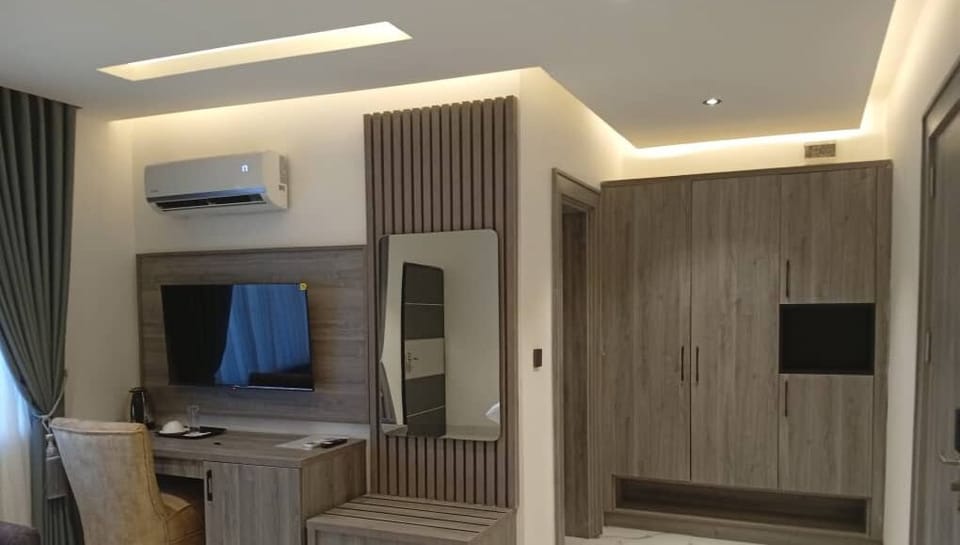 Luxury Room, Balcony, City View | Desk, laptop workspace, free WiFi, bed sheets