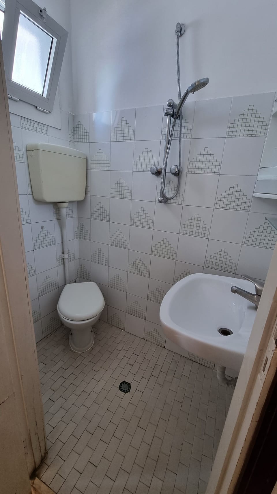 Economy Quadruple Room | Bathroom | Shower, hair dryer, towels, soap
