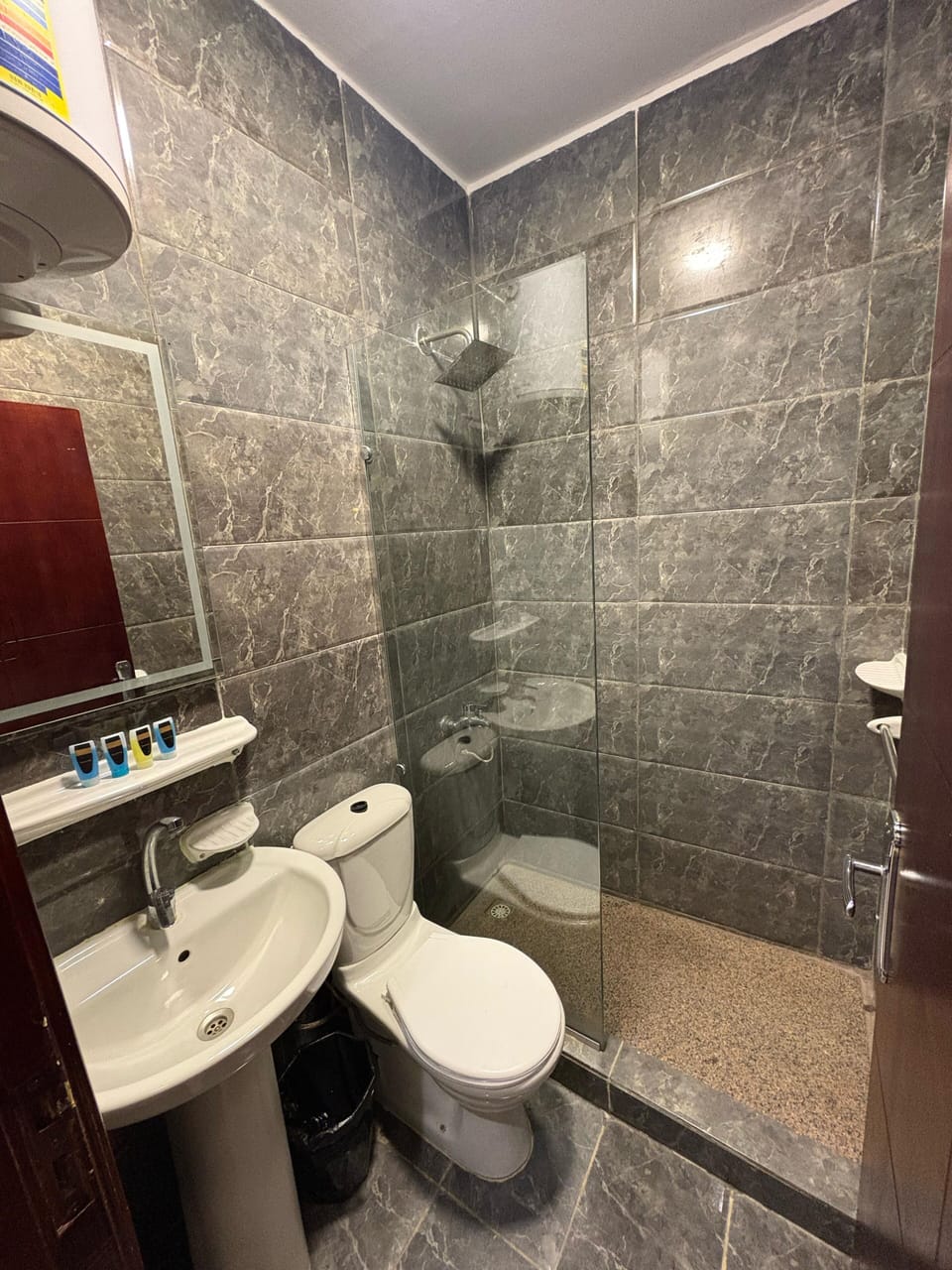 Basic Double Room | Bathroom | Shower, free toiletries, hair dryer (on request), towels