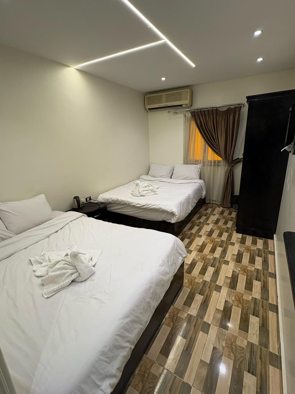 Basic Quadruple Room | WiFi (free), bed sheets