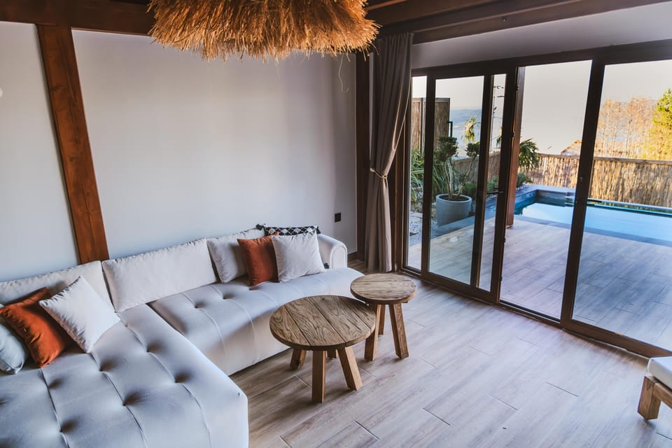 Bungalow, Lake View | Living area | Flat-screen TV