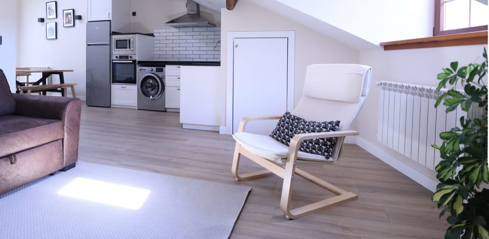 Luxury Apartment, City View | Living area | 50-inch Smart TV with cable channels