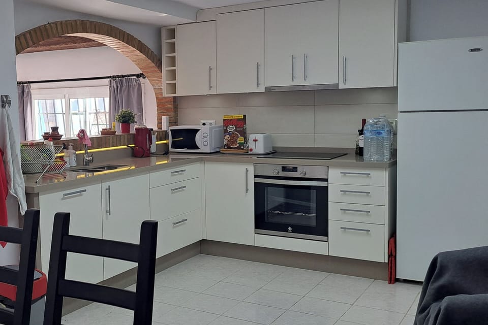 Villa | Private kitchen | Fridge, microwave, oven, stovetop