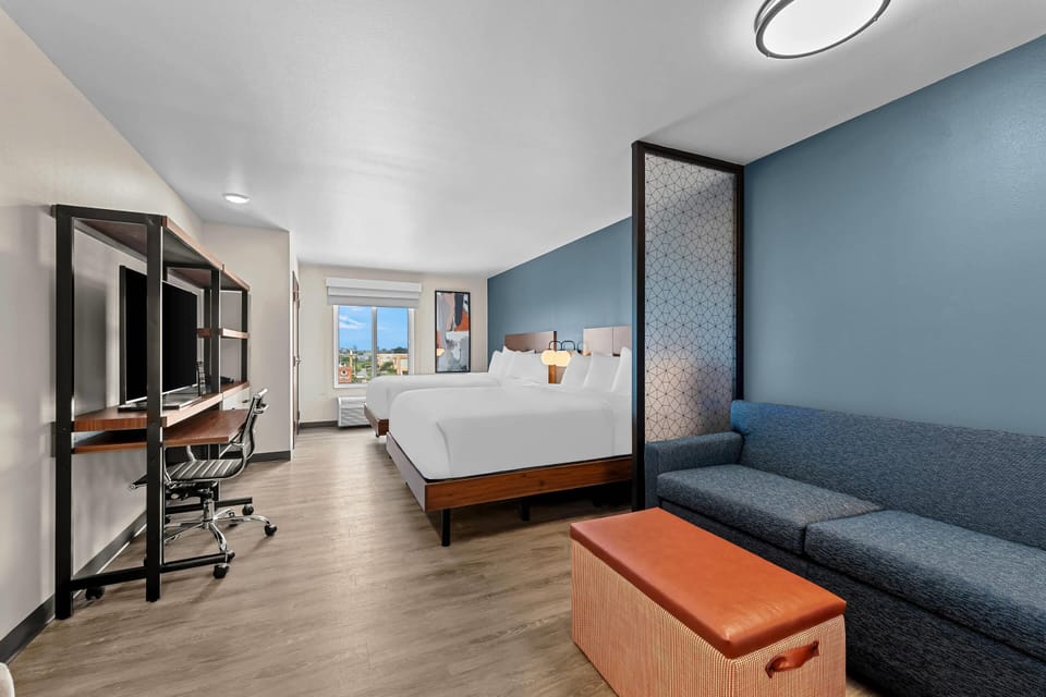 Suite, 2 Queen Beds, Non Smoking | Living area | 42-inch flat-screen TV with cable channels