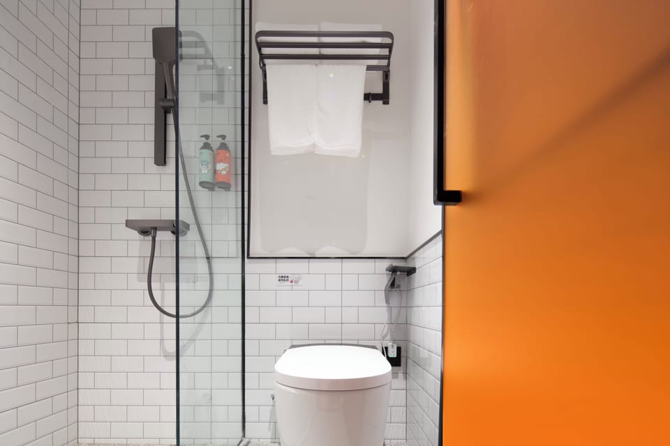Shower, hydromassage showerhead, hair dryer, bathrobes