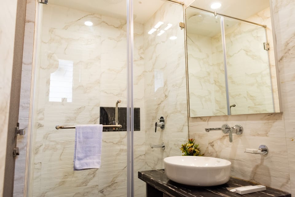 Shower, towels, soap, shampoo