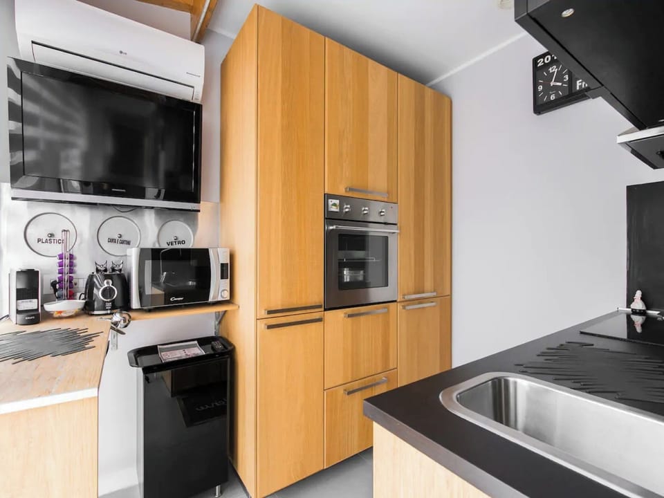 Panoramic Penthouse | Private kitchen | Full-size fridge, microwave, oven, stovetop