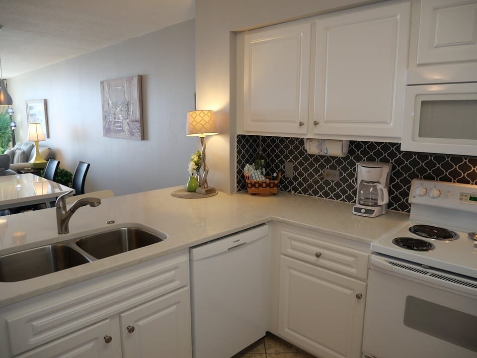 Condo, 2 Bedrooms | Private kitchen | Coffee/tea maker, fridge, oven, toaster