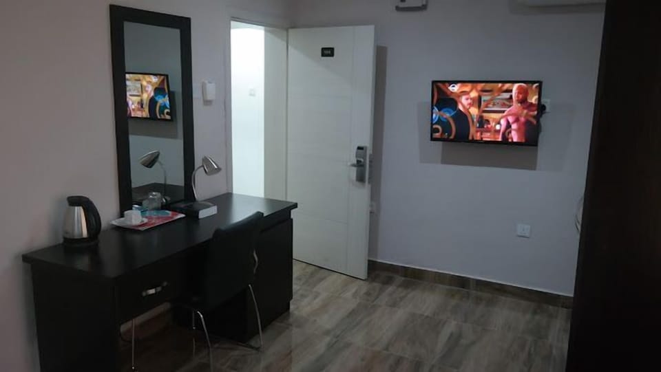 Family Apartment, Balcony, City View | 1 bedroom, in-room safe, desk, laptop workspace