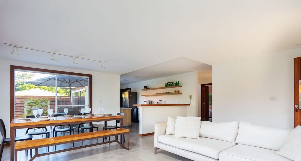 Deluxe House | Living area | 32-inch Smart TV with satellite channels