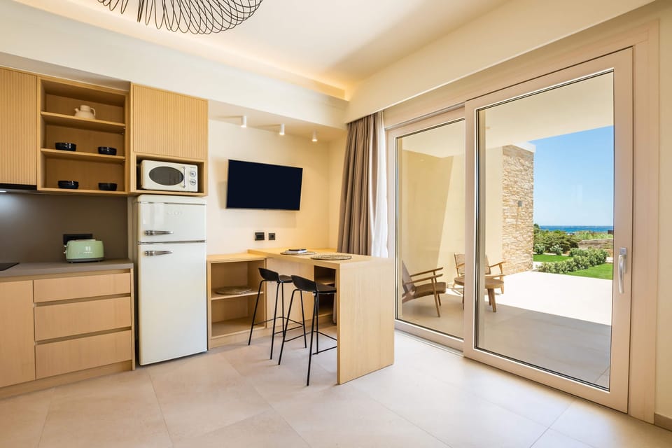 Superior Apartment | Living area | 32-inch LCD TV with satellite channels