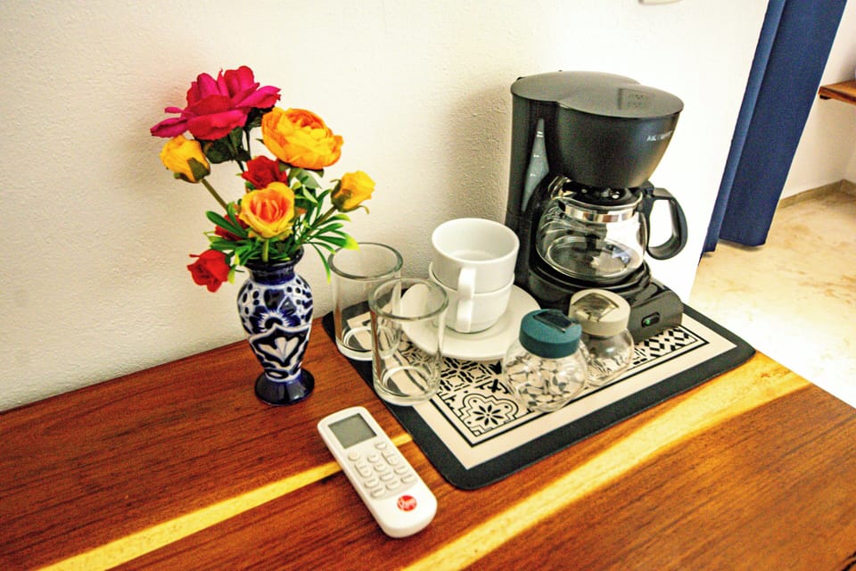 Superior Room, Balcony, Pool View | Coffee and/or coffee maker