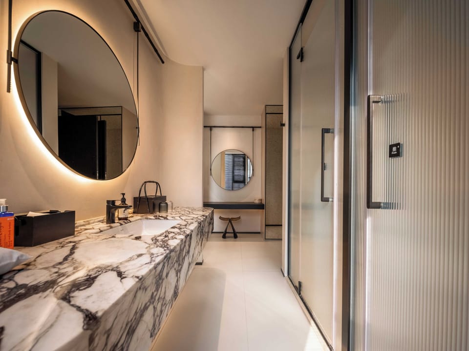 Superior Double Room | Bathroom | Designer toiletries, hair dryer, bathrobes, slippers