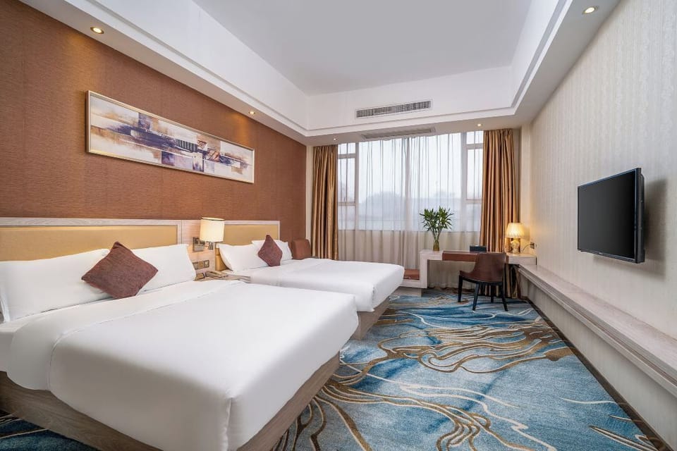 Classic Single Room, City View | Down comforters, desk, laptop workspace, blackout drapes