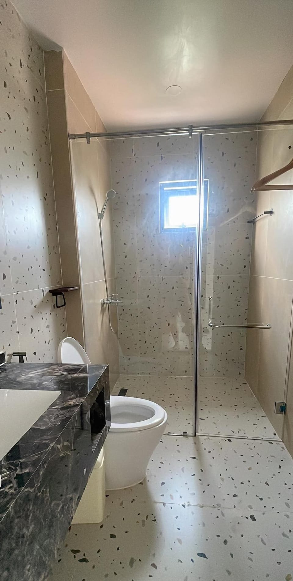 Basic Single Room, City View | Bathroom | Shower, hair dryer, slippers, towels