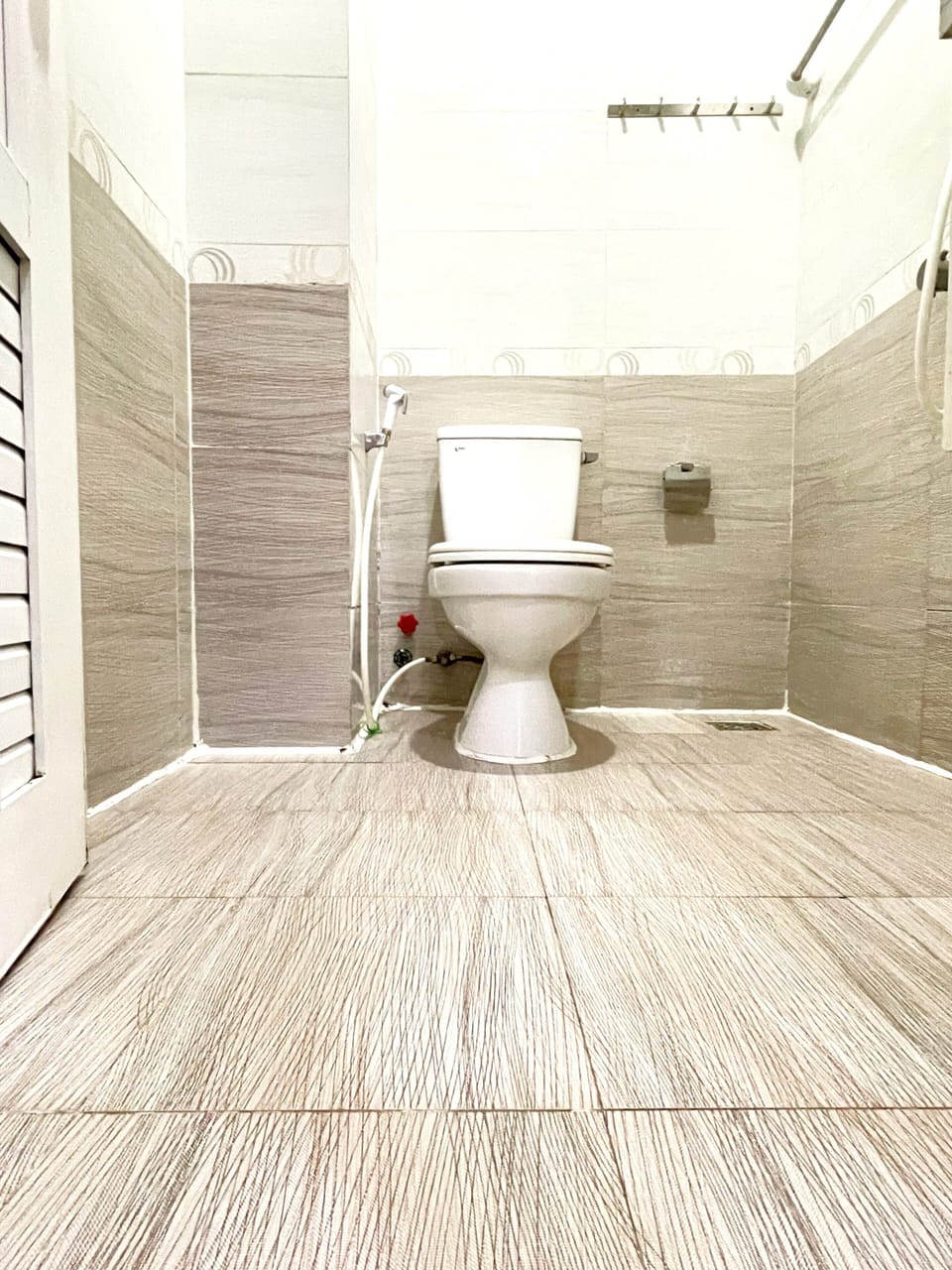 Deluxe Room, 1 Queen Bed, Balcony, City View (201) | Bathroom | Shower, hydromassage showerhead, hair dryer, slippers
