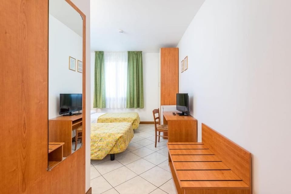 Desk, laptop workspace, WiFi (free), bed sheets