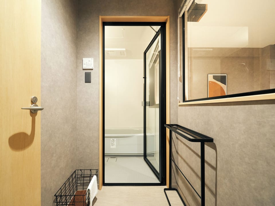 Twin Room, 2 Double Beds, Non Smoking | Bathroom | Hair dryer, slippers, soap, shampoo