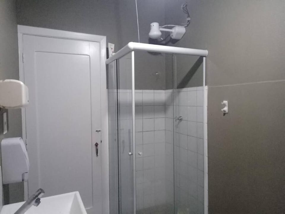 Basic Shared Dormitory | Bathroom | Shower, towels, toilet paper