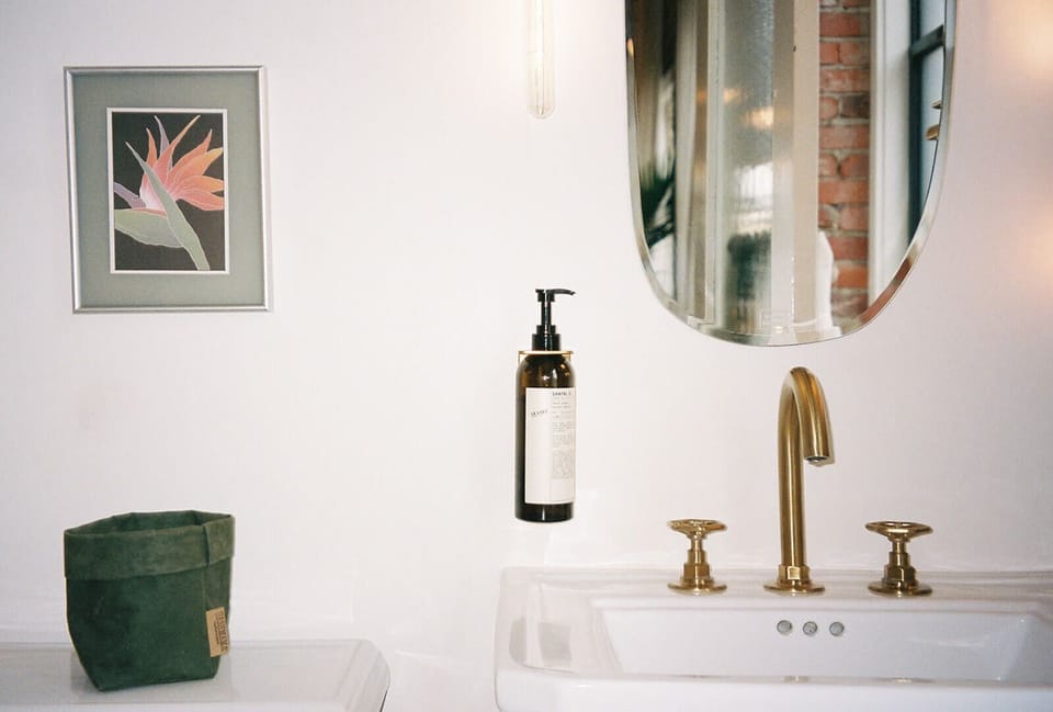 Shower, hair dryer, slippers, towels