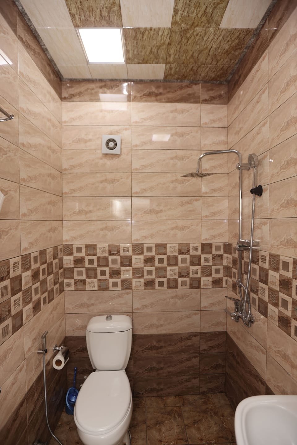 Shower, free toiletries, hair dryer, slippers