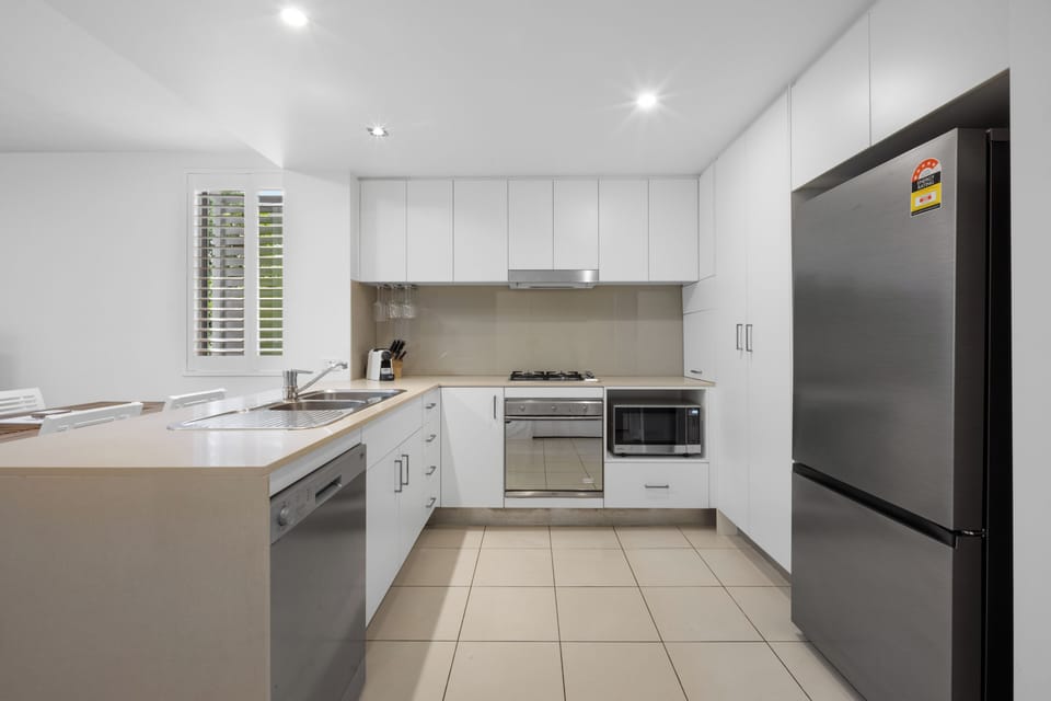 Apartment, 3 Bedrooms, Pool View | Private kitchen | Coffee/tea maker, electric kettle, toaster, cleaning supplies