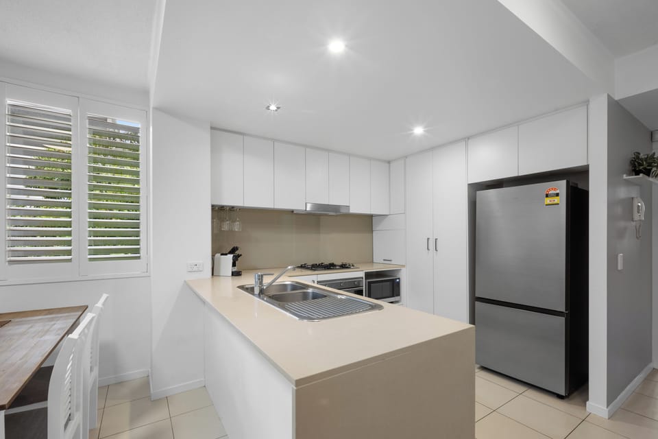 Apartment, 3 Bedrooms, Pool View | Private kitchen | Coffee/tea maker, electric kettle, toaster, cleaning supplies