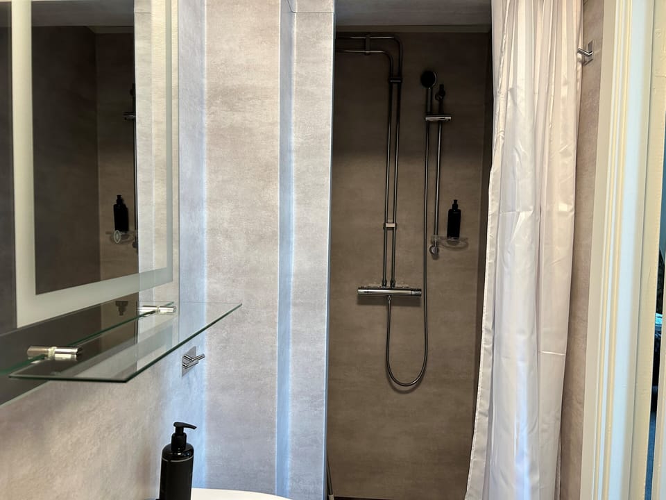 Quadruple Room, Lake View | Bathroom | Shower, hair dryer, towels, soap