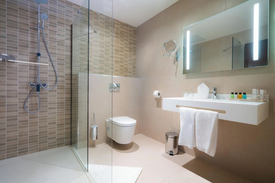 Shower, free toiletries, hair dryer, towels