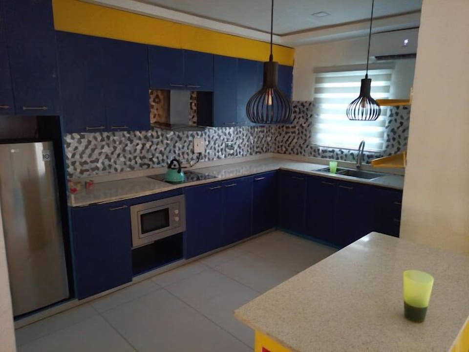Family Room, Balcony, City View | Private kitchen | Mini-fridge