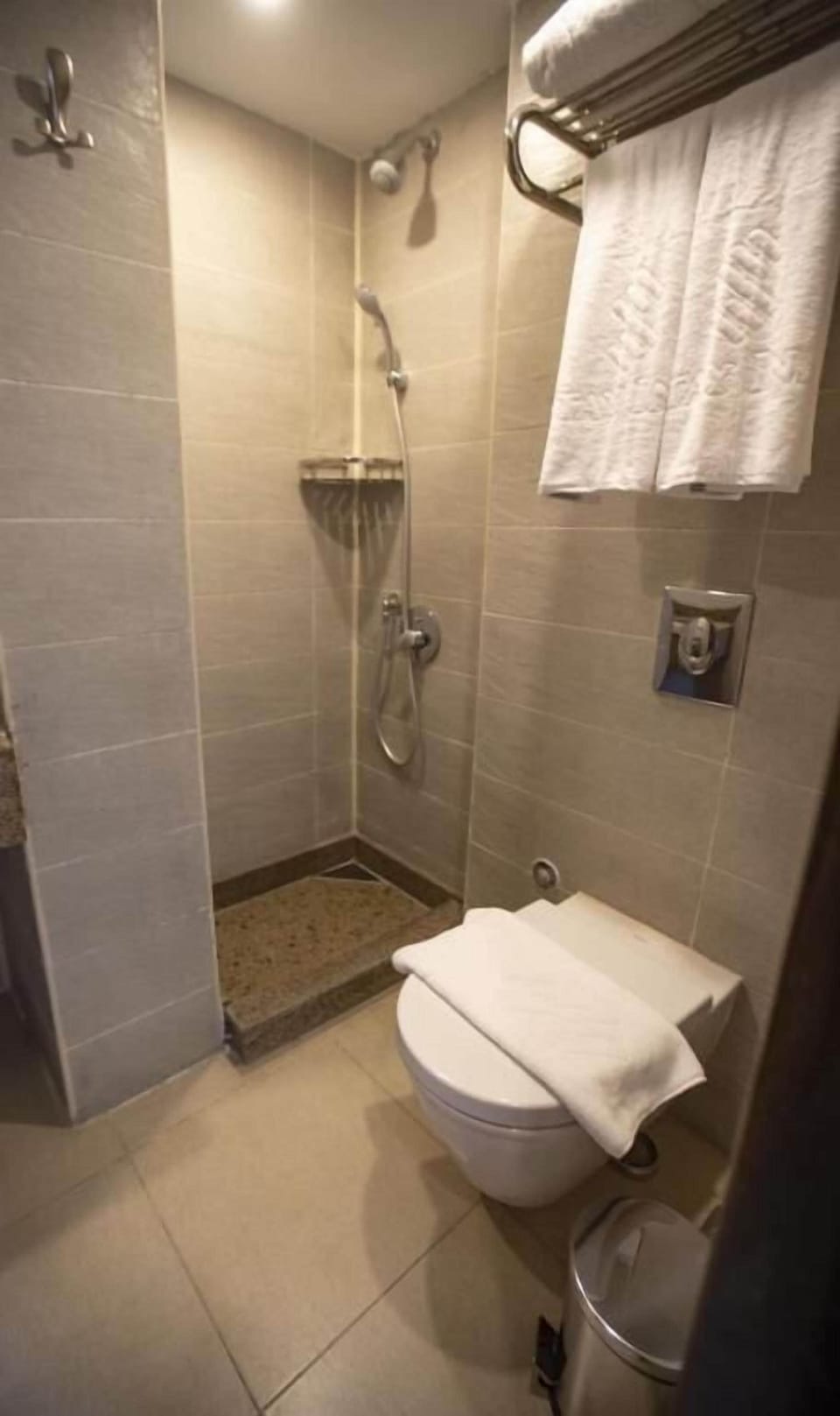Combined shower/tub, hair dryer, towels, soap
