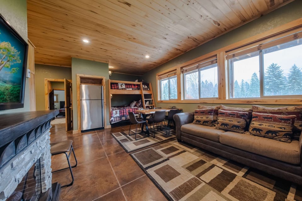 House, Multiple Beds, Patio, Mountain View (Flathead River Retreat) | Living area | 55-inch flat-screen TV with digital channels, fireplace