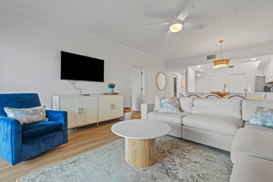 Condo, Multiple Beds (Shipwatch Riverside E104) | Living area | TV