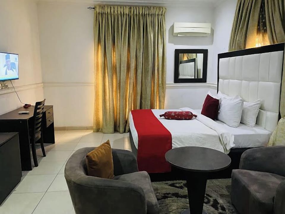 Family Room, Balcony, City View | Desk, laptop workspace, blackout drapes, soundproofing