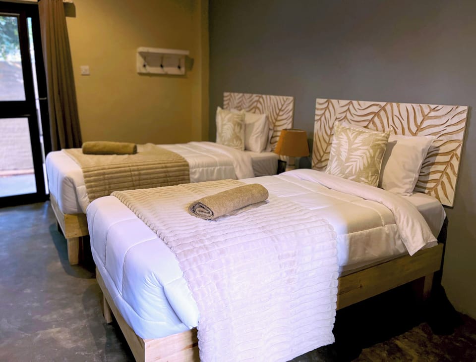 Comfort Twin Room, Patio, Garden View | Desk, laptop workspace, blackout drapes, free WiFi